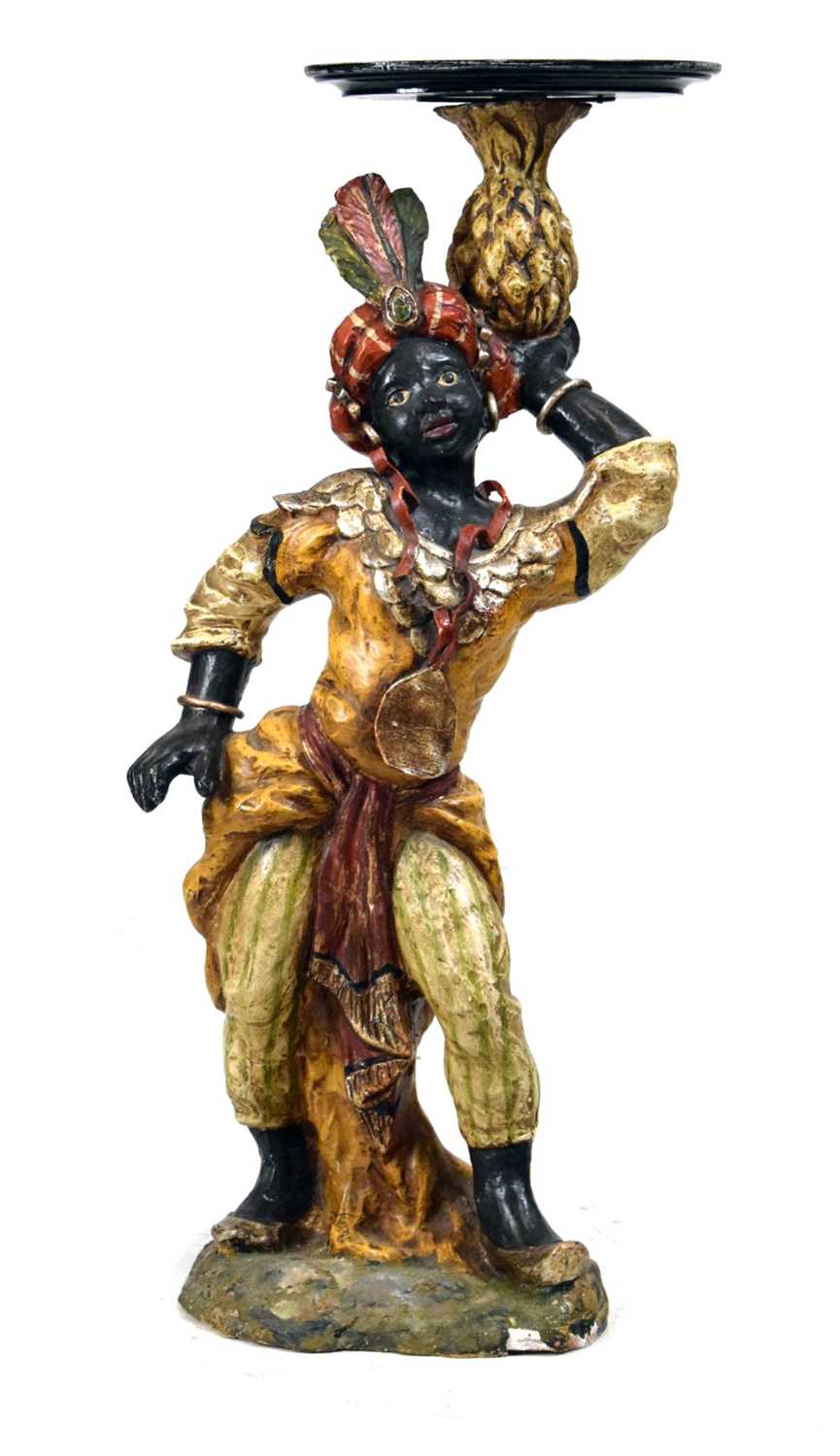 Lot 456 - Painted terracotta figure of a blackamoor