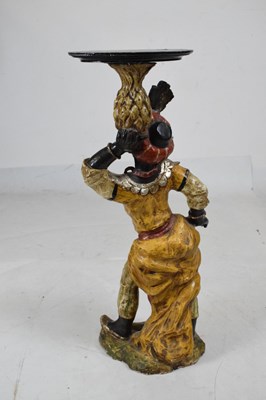 Lot 456 - Painted terracotta figure of a blackamoor