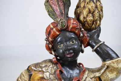 Lot 456 - Painted terracotta figure of a blackamoor