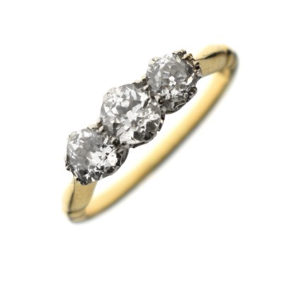 Lot 65 - Diamond three-stone yellow metal ring