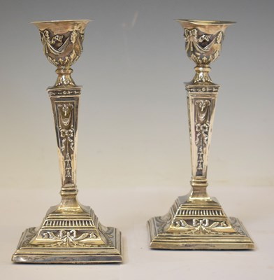 Lot 332 - Pair of Edward VII silver candlesticks in the neo-classical manner