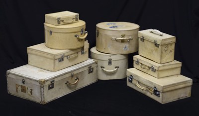 Lot 428 - Collection of mid-20th century vellum covered luggage