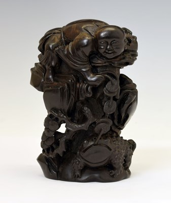Lot 228 - Chinese carved hardwood figure of Liu Haichan with a toad