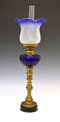 Lot 567 - Brass and blue glass oil lamp or paraffin lamp