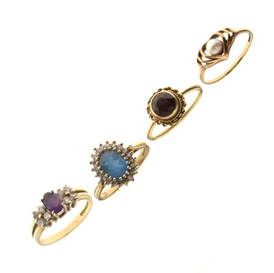 Lot 95 - Three 9ct gem set rings and a seed pearl set ring (4)