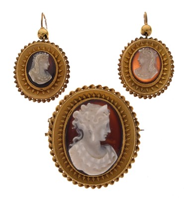 Lot 33 - Cased Victorian unmarked yellow metal cameo brooch and pair of earrings