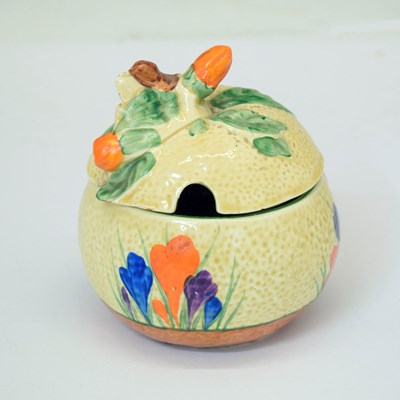 Lot 495 - Clarice Cliff 'Crocus' pattern preserve pot and cover