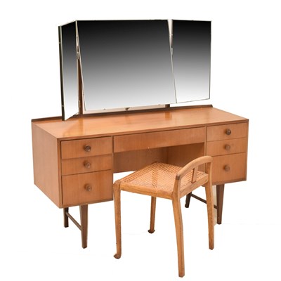 Lot 654 - 1970s teak-veneered retro dressing table