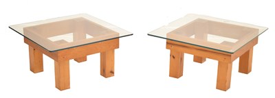 Lot 657 - Pair of toughened glass and pine framed small square low coffee tables