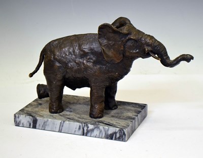Lot 370 - 20th century bronzed model of an elephant on marble base
