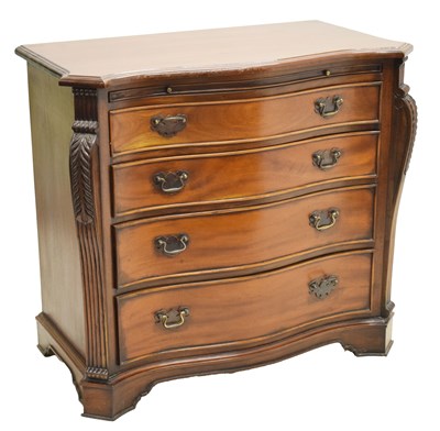 Lot 747 - 20th century mahogany serpentine front chest of drawers with brushing slide