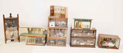 Lot 466 - Large collection of doll house scenes in display cabinets