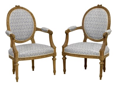 Lot 513 - Pair of early 20th century limewood open armchairs or fauteuils by Charles W. Tozer