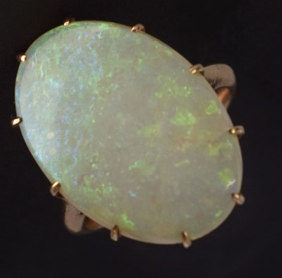 Lot 90 - Precious white opal rose metal ring