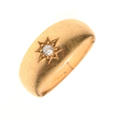 Lot 55 - Gypsy set solitaire diamond yellow metal ring