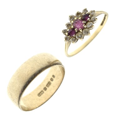Lot 101 - Ruby and white stone 9ct gold cluster ring, and a 9ct gold wedding band (2)