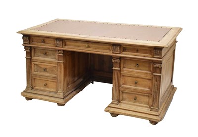 Lot 698 - Mid 20th century pine desk with inset leatherette top
