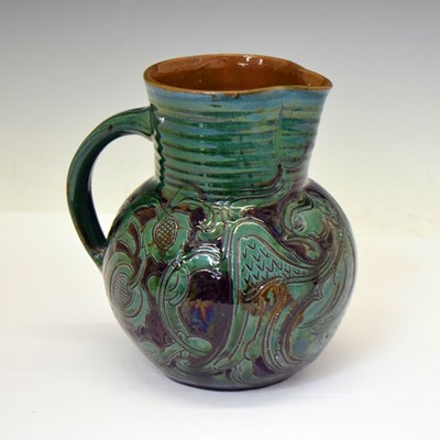 Lot 390 - Charles Brannam (Barnstaple) Barum ware pottery jug