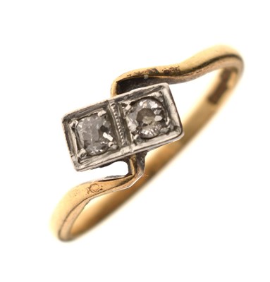 Lot 11 - Diamond two-stone crossover ring