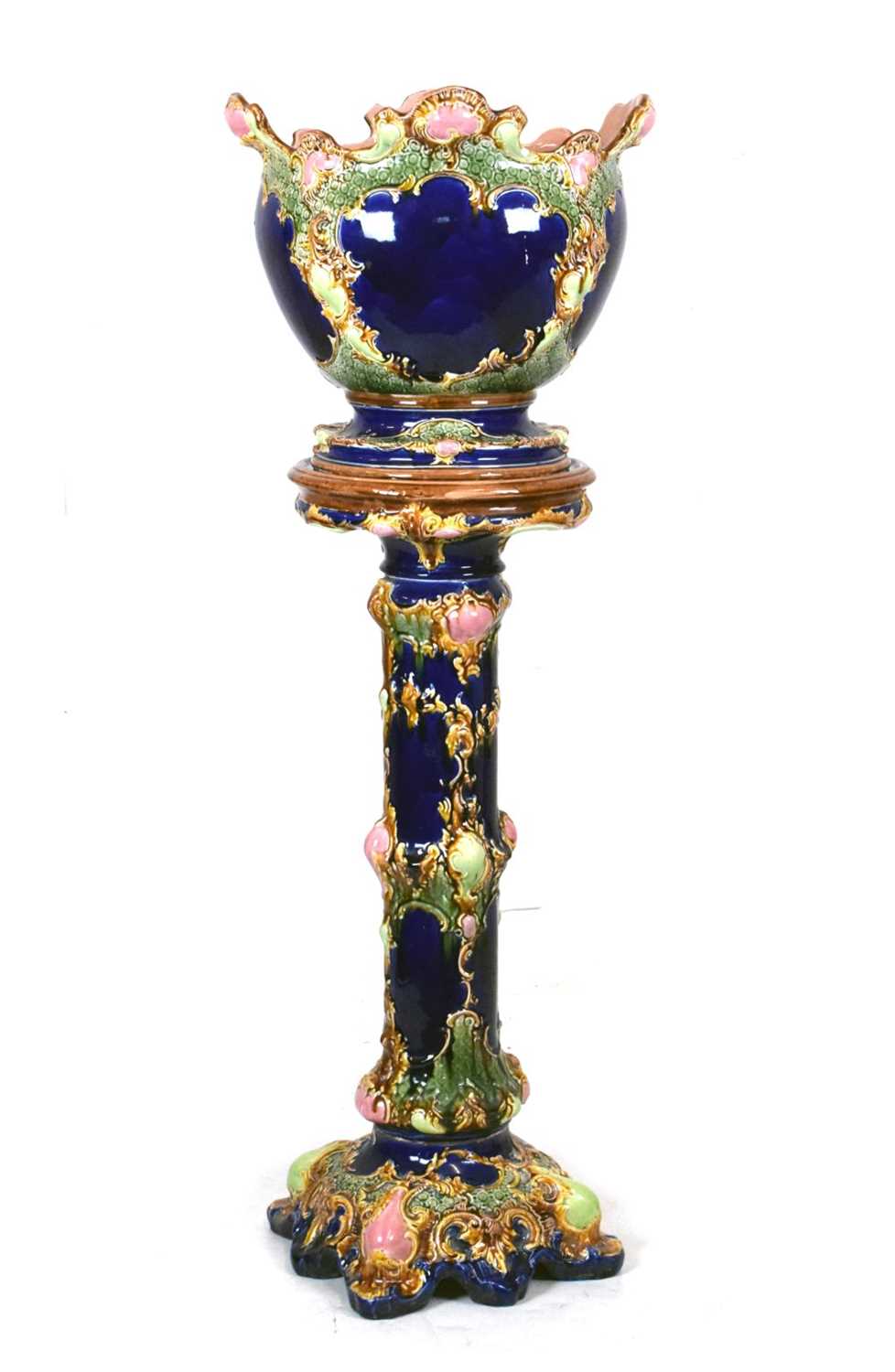 Lot 678 - Majolica jardiniere or planter and stand