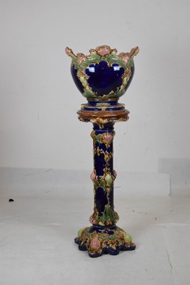 Lot 678 - Majolica jardiniere or planter and stand