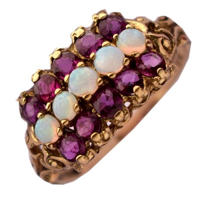 Lot 23 - 1970s opal and ruby 9ct gold dress ring