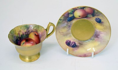 Lot 413 - Royal Worcester - Fruit painted porcelain matched cup and saucer
