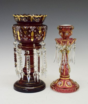 Lot 574 - Cranberry glass lustre with clear drops (31cm high), together with a similar example