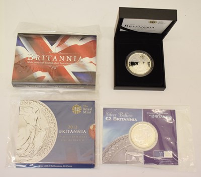 Lot 219 - Elizabeth II - Royal Mint - Four one-ounce silver proof Britannia coins, 2000, 2011, and 2012 x 2