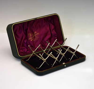 Lot 85 - Set of four late Victorian silver novelty knife rests in the form of cross golf clubs