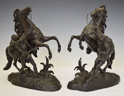 Lot 281 - Spelter pair of Marly horses with handlers