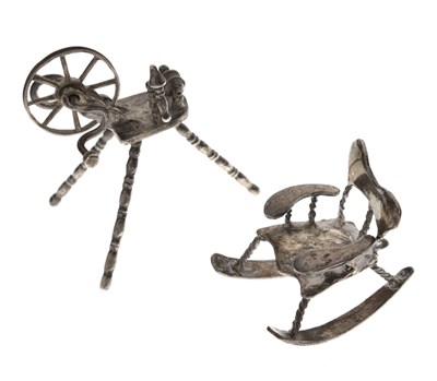 Lot 134 - Continental white metal novelty miniature spinning wheel and rocking chair