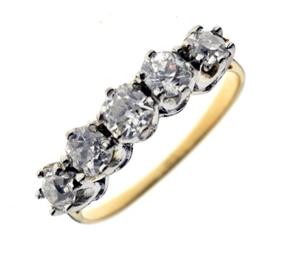 Lot 8 - Diamond five stone yellow metal ring