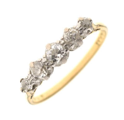 Lot 7 - Yellow and white metal five-stone diamond ring