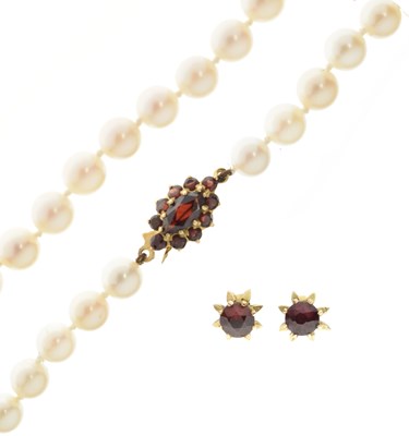 Lot 62 - Cultured pearl necklace having a 9ct gold clasp set with garnets, and a pair of garnet stud earrings