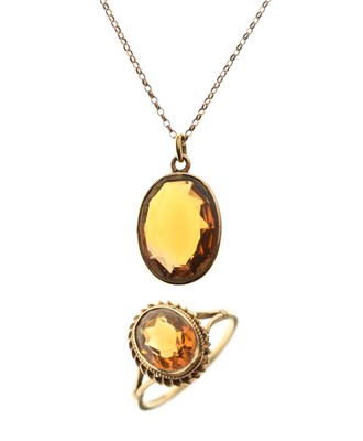 Lot 38 - Citrine 9ct gold dress ring, and a citrine yellow metal pendant on a gold-plated chain (2)