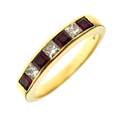 Lot 16 - Ruby and diamond seven-stone 18ct gold ring
