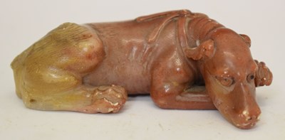 Lot 452 - Chinese carved russet jade dog