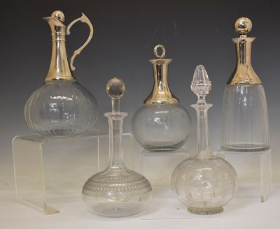 Lot 302 - Set of three late 20th century decanters/claret jugs, together with two cut glass decanters