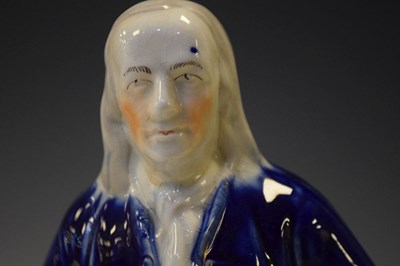 Lot 357 - Staffordshire pottery figure of Benjamin Franklin