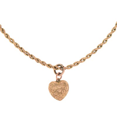 Lot 64 - Victorian 9ct rose gold heart-shaped pendant and a 9ct gold rope link chain