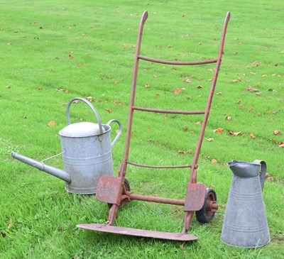 Lot 593 - Vintage sack trucks, galvanised watering can and jug