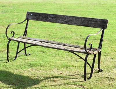 Lot 708 - Wrought iron-framed teak garden bench