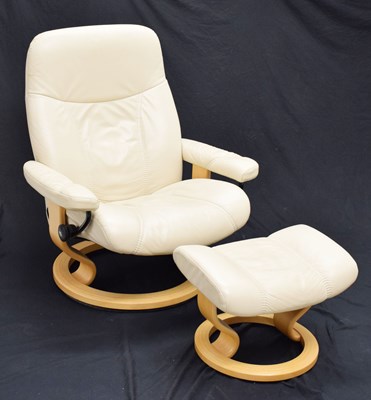 Lot 574 - Stressless cream leatherette reclining armchair and footstool