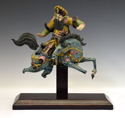 Lot 210 - Chinese wucai glazed terracotta figure on horseback
