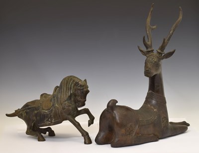 Lot 436 - Eastern bronzed metal figure of a reclining stag, and Chinese style horse