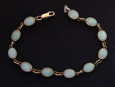 Lot 116 - Opal yellow metal bracelet