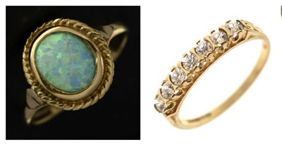 Lot 20 - 9ct gold half eternity ring set seven cubic zirconias and an opal 9ct gold ring (a/f)