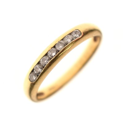 Lot 16 - 18ct gold diamond half eternity ring