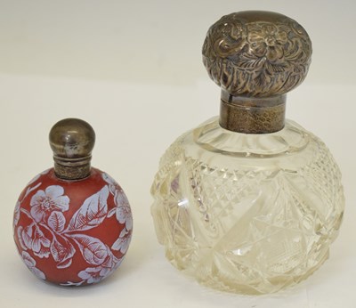 Lot 176 - Two silver mounted glass perfume or scent bottles